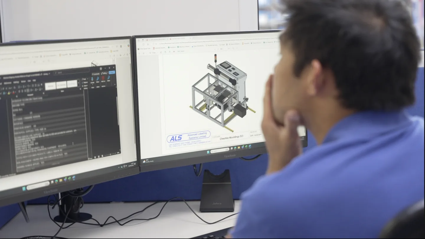 ALS design engineer working at a 3D CAD station